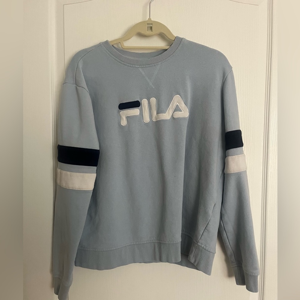 blue fila crewneck with white and blue stripes